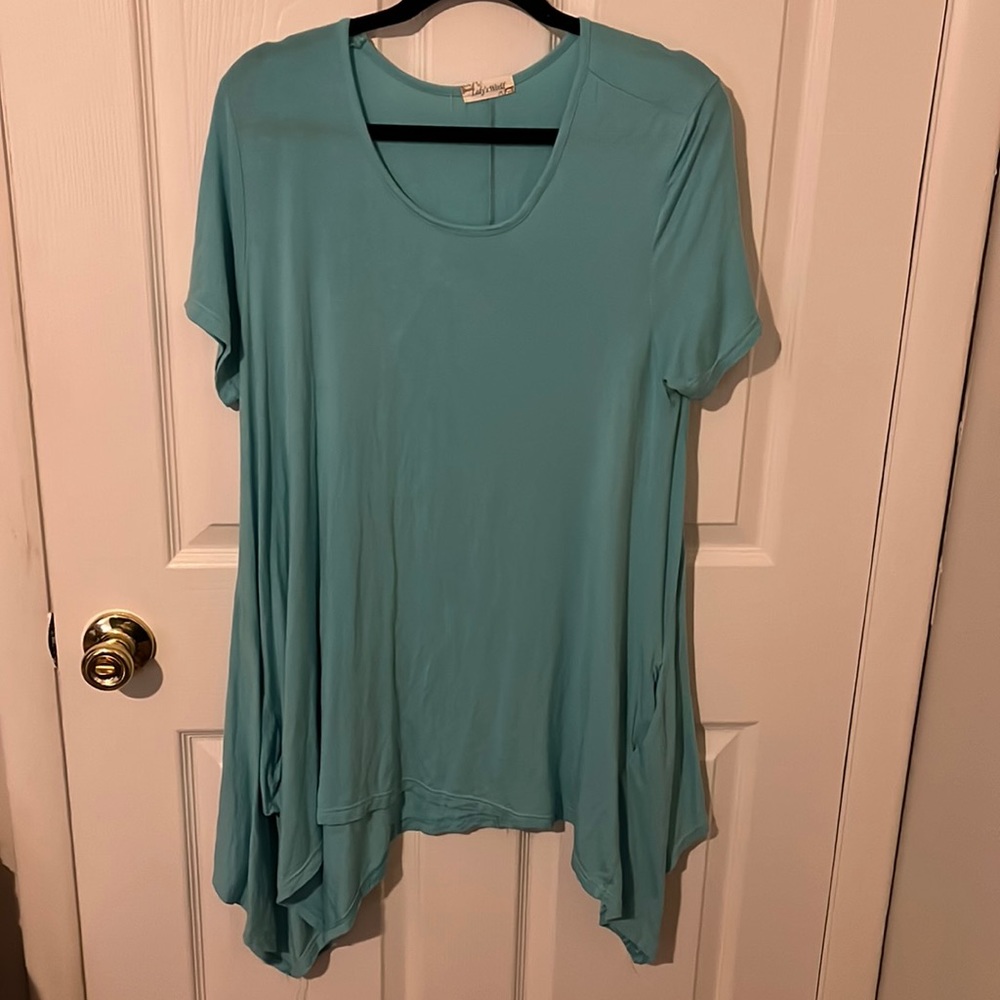 Turquoise Sharkbite Hem Top With Pockets